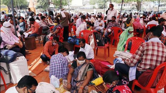 Polling officials check polling materials at a booth on the eve of the fourth phase of gram panchayat elections, in UP’s Mathura on April 28. (File photo)