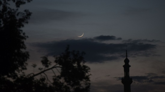 A view of the crescent moon seen from Srinagar on Eid-al-Fitr, in Jammu and Kashmir, on May 13.(Waseem Andrabi / HT Photo)