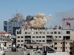 Smoke rises during an Israeli airstrike, amid a flare-up of Israeli-Palestinian violence, in Gaza City.