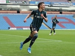 Leeds United's Rodrigo celebrates scoring their fourth goal.