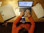 A survey found that individuals were facing a more difficult balance between home life and staying productive in their home offices.(Bloomberg) A survey found that individuals were facing a more difficult balance between home life and staying productive in their home offices.(Bloomberg)
