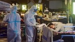 Health workers inspect Covid-19 patients undergoing treatment at Shehnai Banquet Hall, converted into an isolation centre amid surge in cases in New Delhi. (PTI file photo) Health workers inspect Covid-19 patients undergoing treatment at Shehnai Banquet Hall, converted into an isolation centre amid surge in cases in New Delhi. (PTI file photo)