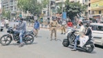 Police officials take action against violaters in Kondhwa, on Friday. (Rahul Raut/HT PHOTO) Police officials take action against violaters in Kondhwa, on Friday. (Rahul Raut/HT PHOTO)