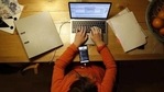 A survey found that individuals were facing a more difficult balance between home life and staying productive in their home offices.(Bloomberg) A survey found that individuals were facing a more difficult balance between home life and staying productive in their home offices.(Bloomberg)