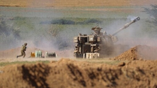 An Israeli artillery unit fires toward targets in Gaza Strip, at the Israeli Gaza border, Saturday, May 15, 2021. (AP Photo/Ariel Schalit) An Israeli artillery unit fires toward targets in Gaza Strip, at the Israeli Gaza border, Saturday, May 15, 2021. (AP Photo/Ariel Schalit)