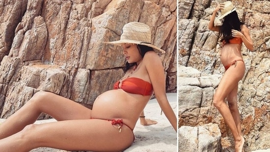 Mom-to-be Lisa Haydon took to Instagram and shared pictures of her sun-kissed look in an orange bikini and flaunted her baby bump from Lantau Island in Hong Kong.(Instagram/@lisahaydon)