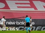 Real Madrid's Nacho scores the winning goal against Athletic Bilbao in a LaLiga encounter.