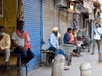 Workers seen outside shuttered shops at Khari Baoli during the Covid-19 induced lockdown, in New Delhi.(Sanjeev Verma/HT PHOTO) Workers seen outside shuttered shops at Khari Baoli during the Covid-19 induced lockdown, in New Delhi.(Sanjeev Verma/HT PHOTO)