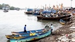 Fishermen anchored their boats at Versova beach due to formation of Cyclone Tauktae in the Arabian Sea, in Mumbai on Saturday,(PTI Photo) Fishermen anchored their boats at Versova beach due to formation of Cyclone Tauktae in the Arabian Sea, in Mumbai on Saturday,(PTI Photo)