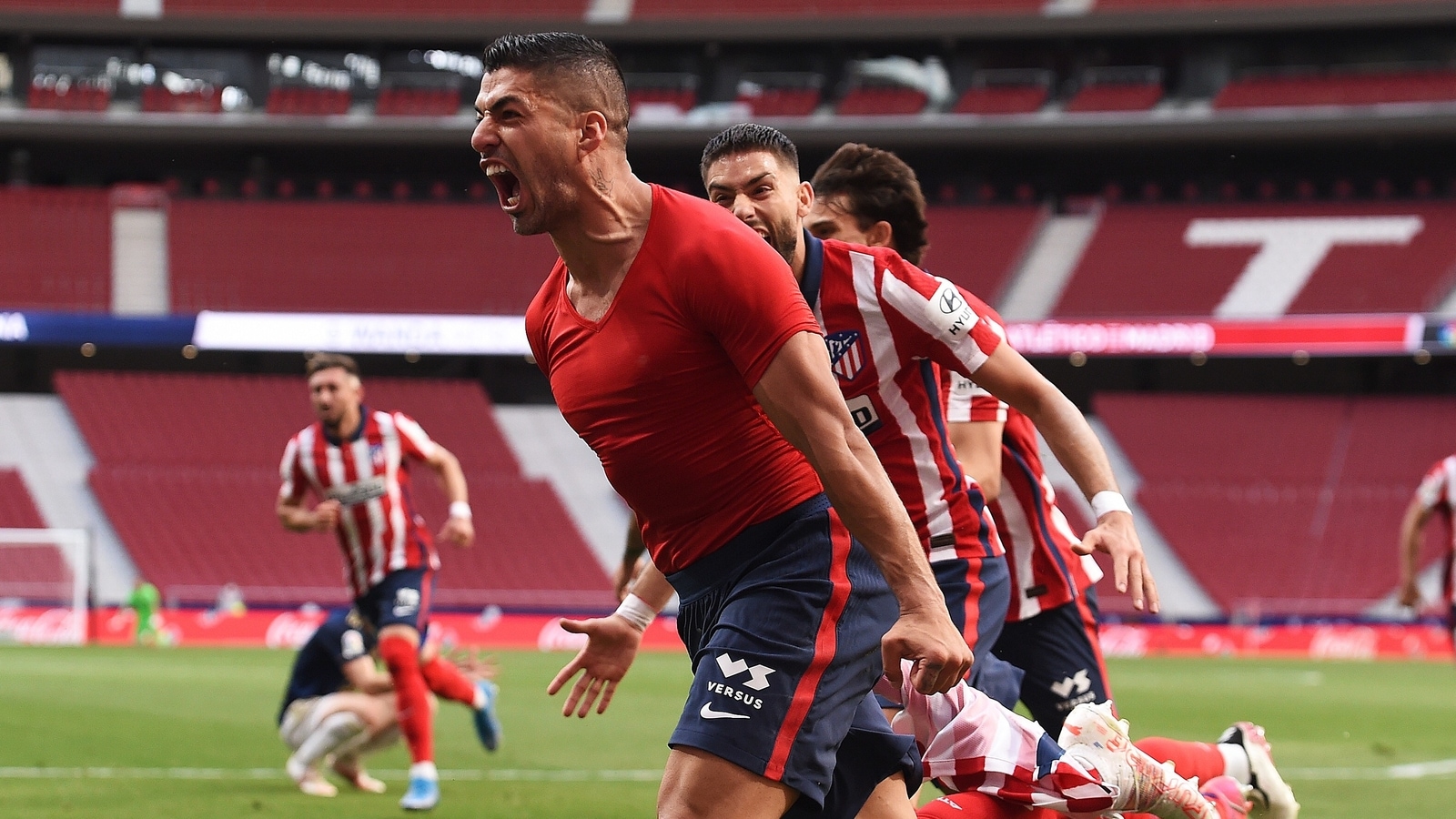 Luis Suarez leads Atletico Madrid to La Liga title on dramatic