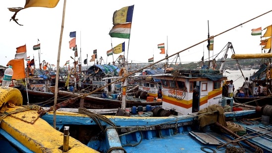 At the Cacra village in Bambolim near state capital Panaji, fishermen were seen rushing back from the sea with their canoes as gusty winds hit the coast. (PTI) At the Cacra village in Bambolim near state capital Panaji, fishermen were seen rushing back from the sea with their canoes as gusty winds hit the coast. (PTI)
