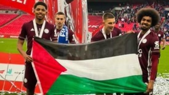 Leicester players Hamza Choudhury and Wesley Fofana with a Palestine flag after their win over Chelsea in the final of FA Cup(Twitter/Palestine in the UK)