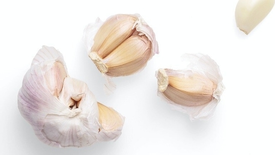 Garlic: Applying garlic on your face can leave your skin irritated and further cause rashes.(Unsplash)