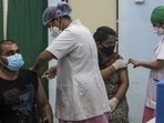BMC medical staff inoculating Covishield vaccine to beneficiaries against Covid-19 at Rajawadi Hospital, Ghatkopar in Mumbai. (Pratik Chorge/HT PHOTO) BMC medical staff inoculating Covishield vaccine to beneficiaries against Covid-19 at Rajawadi Hospital, Ghatkopar in Mumbai. (Pratik Chorge/HT PHOTO)