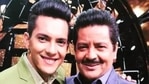 Aditya Narayan poses with dad Udit Narayan.