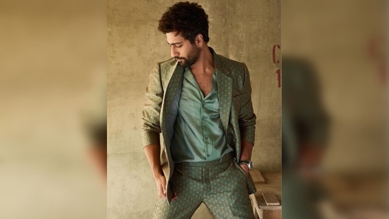 To be honest, this might be our favourite ensemble from the list. The 33-year-old wore it a month ago for a shoot. The well-fitted floral print green suit teamed with a satin green shirt looked marvellous on the actor.(Instagram/ vickykaushal09)