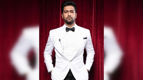 Vicky looked handsome when he donned a classic white suit with a crisp white shirt, a black bow tie and a pair of black pants in February 2020 to host the Filmfare awards.(Instagram/ vickykaushal09)