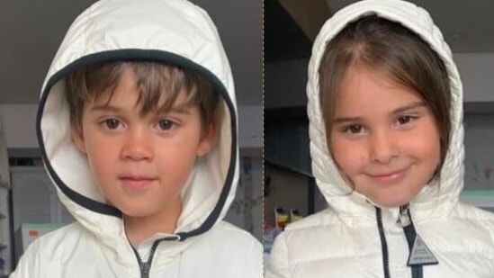 Karan Johar's twins, Yash and Roohi, pose for the camera.