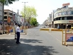 A deserted view of a road during curfew due to a surge in Covid-19 cases, in Bhopal.(ANI) A deserted view of a road during curfew due to a surge in Covid-19 cases, in Bhopal.(ANI)