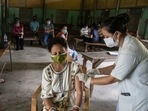 A rising positivity rate in a region indicates that the virus is spreading fast within the community.(AP) A rising positivity rate in a region indicates that the virus is spreading fast within the community.(AP)