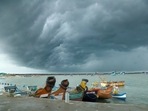 Dark clouds over the sky during Cyclone Tauktae at Vellayil Harbor in Kozhikode on May 17.(PTI) Dark clouds over the sky during Cyclone Tauktae at Vellayil Harbor in Kozhikode on May 17.(PTI)