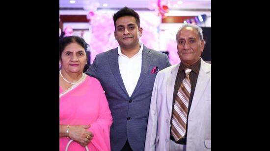 File photo of Mayank Malhotra with his parents. (HT Photo) File photo of Mayank Malhotra with his parents. (HT Photo)