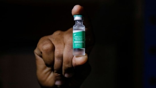 A man displays a vial AstraZeneca's Covishield vaccine. (Reuters)