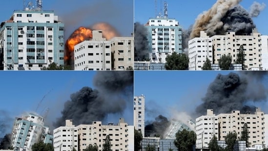 A tower building housing AP, Al Jazeera offices as it collapses after Israeli missile strikes in Gaza city. (Reuters)