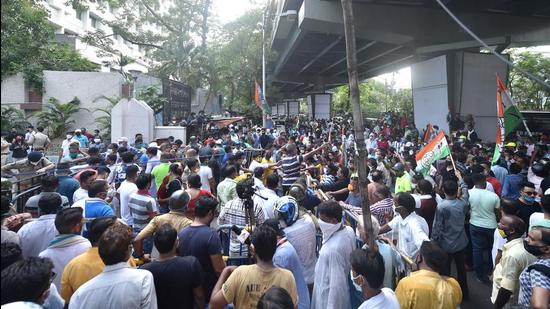 TMC workers gather outside the CBI office at Nizam Palace in protest against the arrest of party ministers and MLAs in connection with the Narada sting case, in Kolkata on Monday, May 17. (PTI)