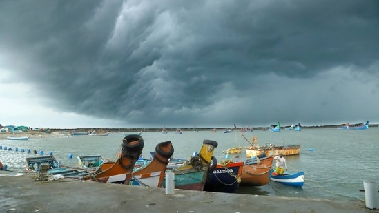 Dark clouds over the sky during Cyclone Tauktae at Vellayil Harbor in Kozhikode on May 17. Tropical cyclones are less common in the Arabian Sea than on India’s east coast and usually form later in the year. Experts say changing climate patterns have caused them to become more intense, rather than more frequent, AP reported.(PTI)
