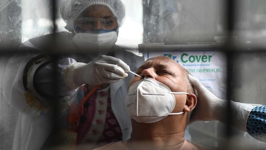 The SUTRA model says that the country reached its Covid-19 peak by May 4 and then the daily cases have seen downward trend. (AFP) The SUTRA model says that the country reached its Covid-19 peak by May 4 and then the daily cases have seen downward trend. (AFP)