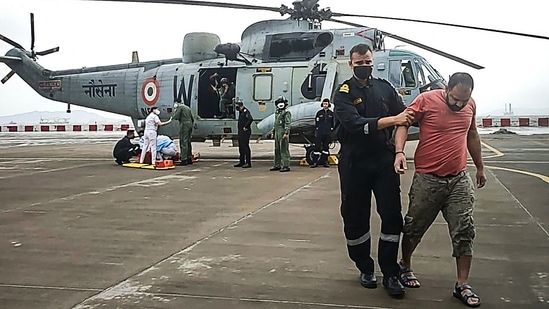Rescue operations by the Indian Navy in Mumbai after Cyclone Tauktae hit the west coast of India.(AFP)
