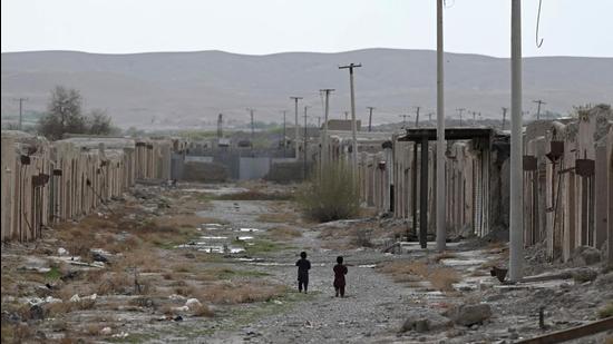 A file photo of children walking in the Tange Bazaar area in Kajaki, northeast of Helmand province, in Afghanistan. (AFP) A file photo of children walking in the Tange Bazaar area in Kajaki, northeast of Helmand province, in Afghanistan. (AFP)