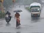 All Deputy Commissioners have been instructed to conduct regular monitoring, Dushyant Chautala said. In picture - Commuters crossing a waterlogged stretch of the road during heavy rains brought by Cyclone Tauktae in Jaipur.