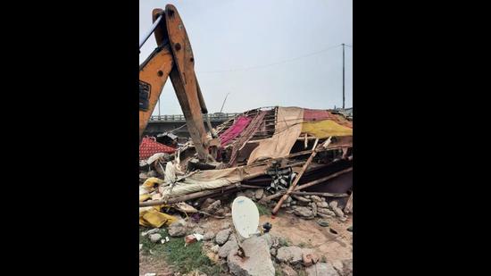 An illegal shanty being demolished during the civic body’s anti-encroachment drive in Ludhiana on Wednesday. (HT Photo) An illegal shanty being demolished during the civic body’s anti-encroachment drive in Ludhiana on Wednesday. (HT Photo)