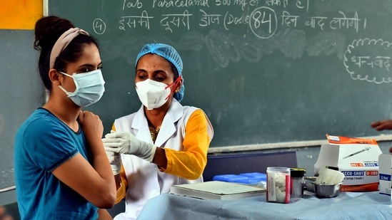 Covid-19 vaccination being performed in New Delhi on May 17. Over 18.5 crore doses of Covid-19 vaccines have been administered across India far. Serum Institute, the largest vaccine manufacturer, has said that it will prioritize making vaccines for India, delaying deliveries to other nations and the World Health Organization-backed Covax initiative until the end of the year, Bloomberg reported. The firm is licensed to churn out at least one billion doses of AstraZeneca’s Covishield shot. (Raj K Raj / HT Photo) Covid-19 vaccination being performed in New Delhi on May 17. Over 18.5 crore doses of Covid-19 vaccines have been administered across India far. Serum Institute, the largest vaccine manufacturer, has said that it will prioritize making vaccines for India, delaying deliveries to other nations and the World Health Organization-backed Covax initiative until the end of the year, Bloomberg reported. The firm is licensed to churn out at least one billion doses of AstraZeneca’s Covishield shot. (Raj K Raj / HT Photo)