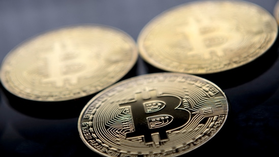 Now, as Bitcoin takes out its 200-day moving average, chart-watchers are warning of more danger ahead. (AFP) Now, as Bitcoin takes out its 200-day moving average, chart-watchers are warning of more danger ahead. (AFP)