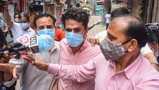 Delhi Police's Crime Branch brings Navneet Kalra for interrogation in connection with alleged black marketing of oxygen concentrators, at his Khan Chacha restaurant in New Delhi, Tuesday, May 18, 2021. (PTI) Delhi Police's Crime Branch brings Navneet Kalra for interrogation in connection with alleged black marketing of oxygen concentrators, at his Khan Chacha restaurant in New Delhi, Tuesday, May 18, 2021. (PTI)