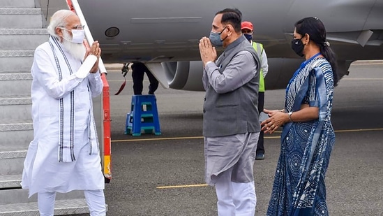 PM Modi was received by Gujarat CM Vijay Rupani at the airport.(PTI)