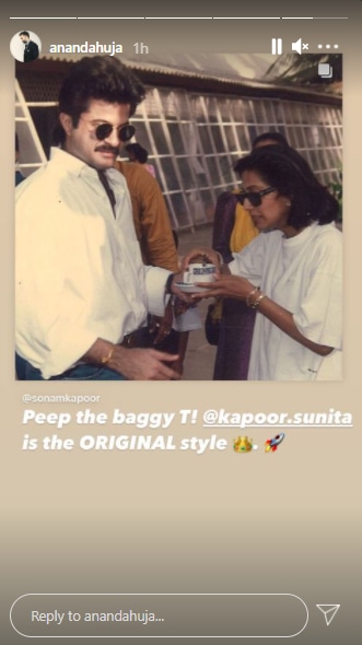The picture showed Sunita offering Anil a cup of beverage wearing a baggy T-shirt.