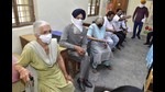 Residents waiting to get inoculated with Covid-19 vaccine dose in Amritsar on Thursday. (Sameer Sehgal/HT) Residents waiting to get inoculated with Covid-19 vaccine dose in Amritsar on Thursday. (Sameer Sehgal/HT)
