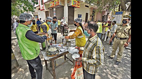 People are volunteering to help the needy affected by Covid-19, instead of spending money on their special occasions. (Burhaan Kinu/ HT (Photo for representational purposes only)) People are volunteering to help the needy affected by Covid-19, instead of spending money on their special occasions. (Burhaan Kinu/ HT (Photo for representational purposes only))