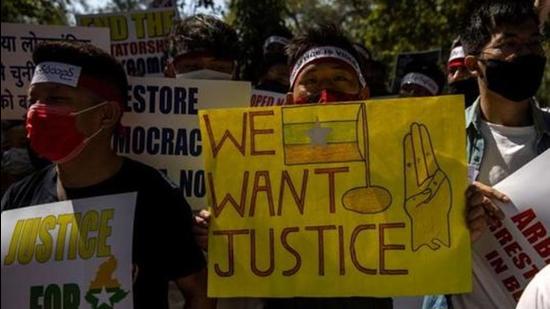 Myanmar citizens in India hold placards during a protest against the military coup in Myanmar, in New Delhi on March 3. (File photo) Myanmar citizens in India hold placards during a protest against the military coup in Myanmar, in New Delhi on March 3. (File photo)