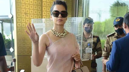 Previously Kangana was seen in a blush pink saree which she paired with a matching blouse, a chunky pearl necklace and a Dior bag. (Instagram) Previously Kangana was seen in a blush pink saree which she paired with a matching blouse, a chunky pearl necklace and a Dior bag. (Instagram)