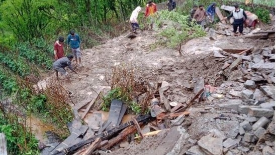 A search and rescue operation was going on with the help of villagers in Kwansi village near Dehradun,(HT Photo)