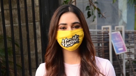 Disha Parmar poses for the camera with a yellow mask on.(Varinder Chawla)