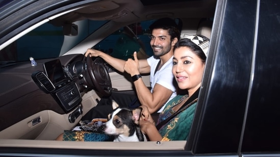 Gurmeet Choudhary and Debina Bonnerjee were seen with their pet sitting in their car.(Varinder Chawla)
