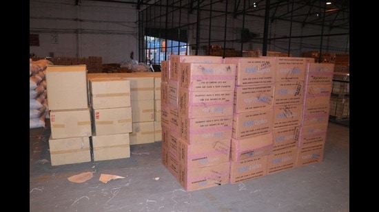 During physical examination of the consignment, 250 undeclared cigarette cartons were found in two containers. (HT Photo) During physical examination of the consignment, 250 undeclared cigarette cartons were found in two containers. (HT Photo)