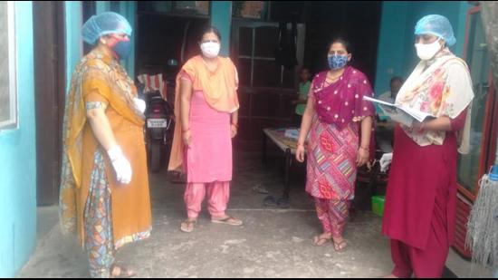 A health department team during a screening drive in an Ambala village. (HT Photo) A health department team during a screening drive in an Ambala village. (HT Photo)
