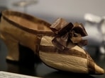 A supposed shoe of Marie-Antoinette, torn from the hands of an insurgent during the capture of the Tuileries on August 10, 1792, is displayed at the Carnavalet-History of Paris Museum, located in the Marais district, during a press visit after four years of renovations in Paris, France, May 20, 2021. (REUTERS)